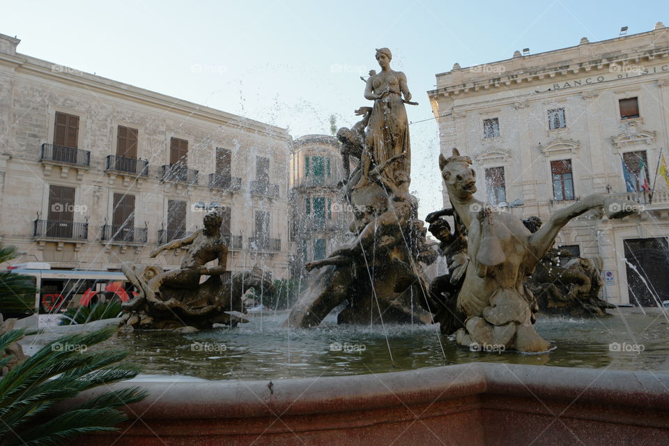 artemide's fountain. fountain in square archimede in ortigia (syracuse)