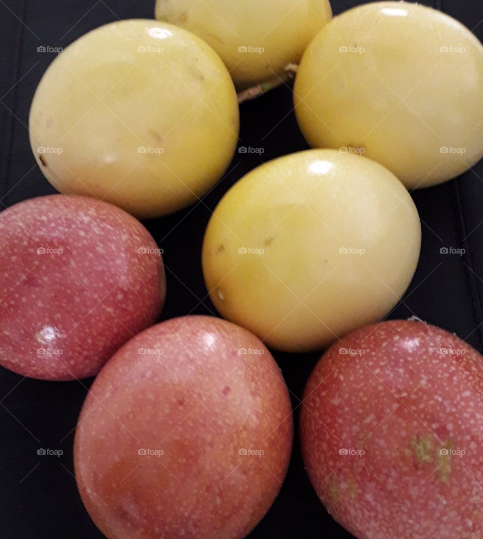 Yellow and red passion fruits