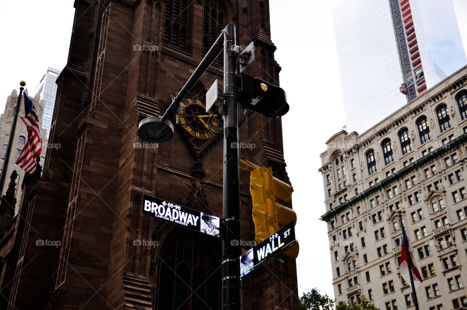 Broadway and wall street Corsa road sign