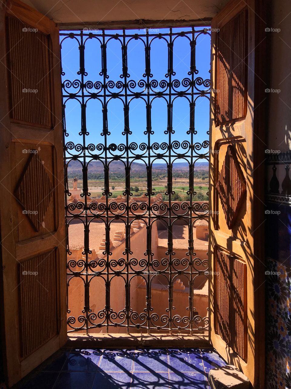 Ancient city through window