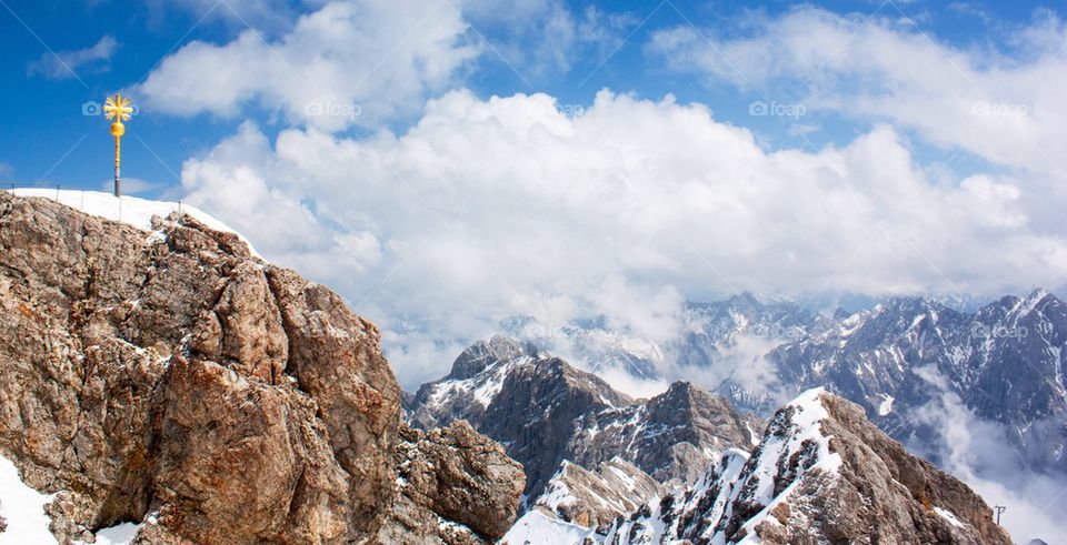 Scenic view of golden cross on zugspitze