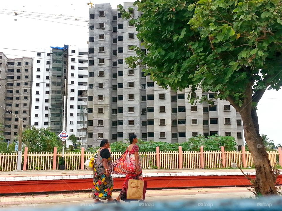 near city. walking near building 