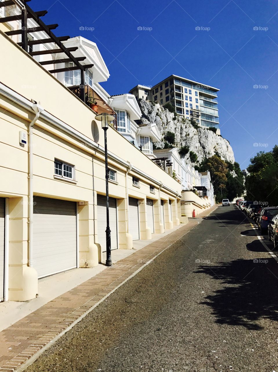 Hill, garages, rock, road