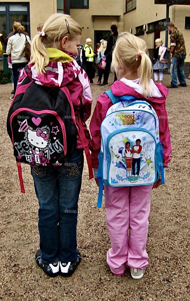  Best friends, first day, first class and brand new backpacks