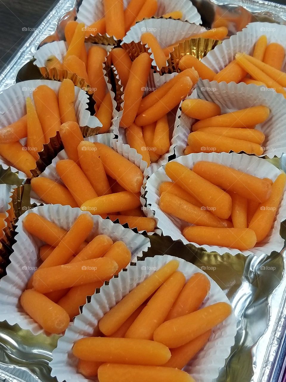 Carrots are a healthy snack,  proportioned perfectly for kids.  vegetables
