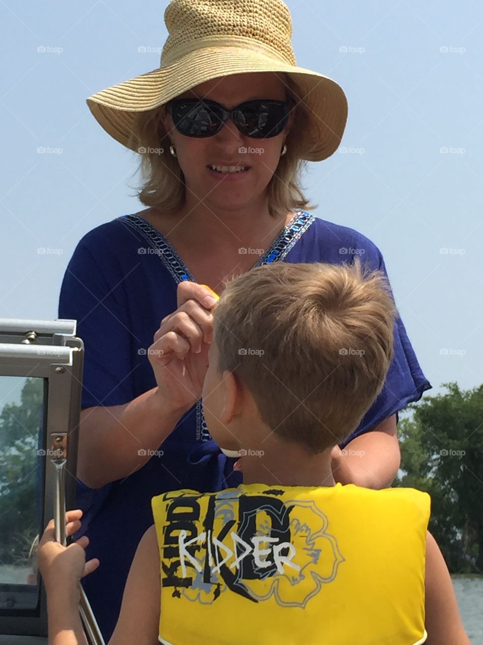 Mom  Applying  Sunscreen 