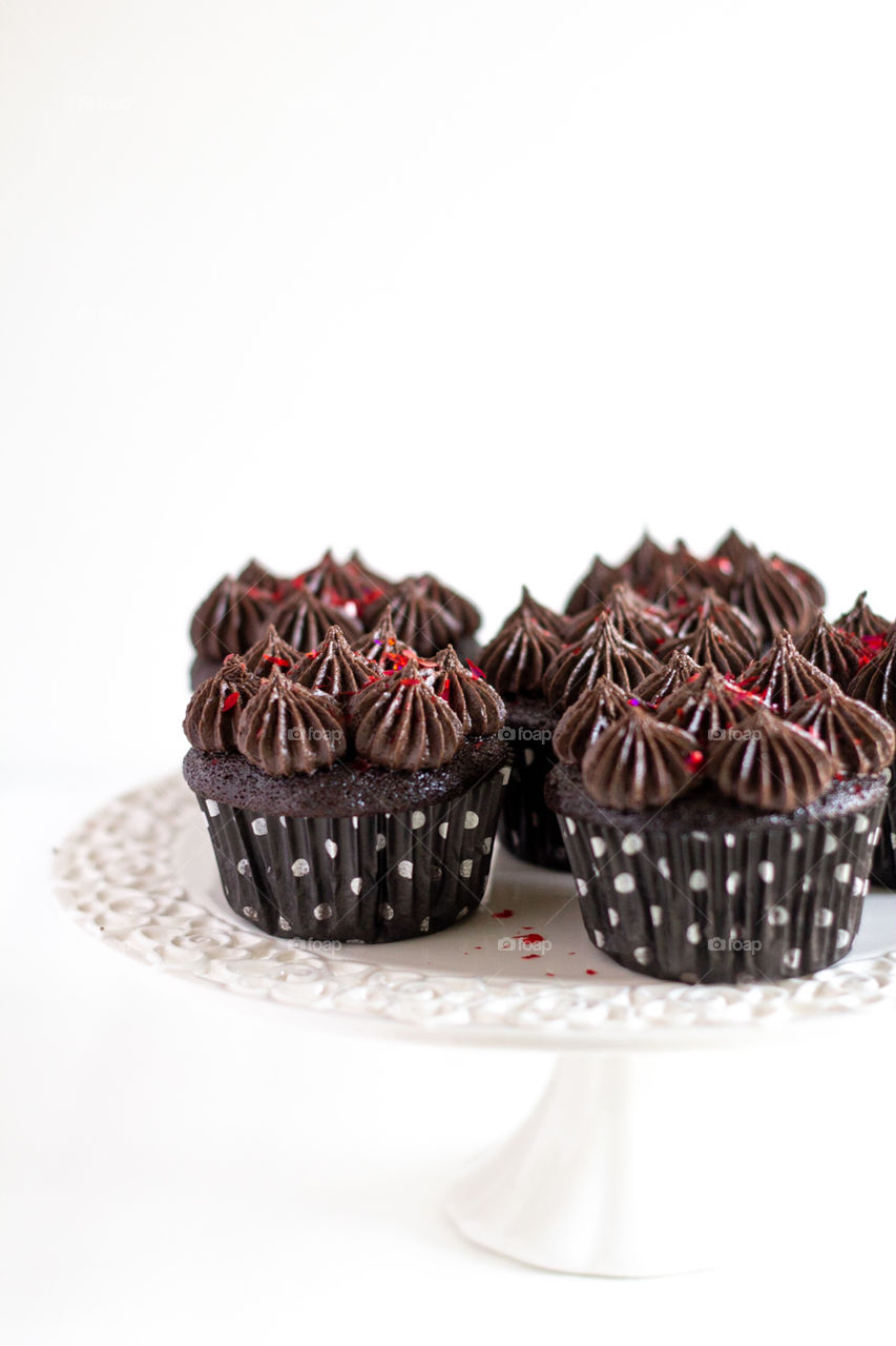 delicious chocolate cupcakes white background