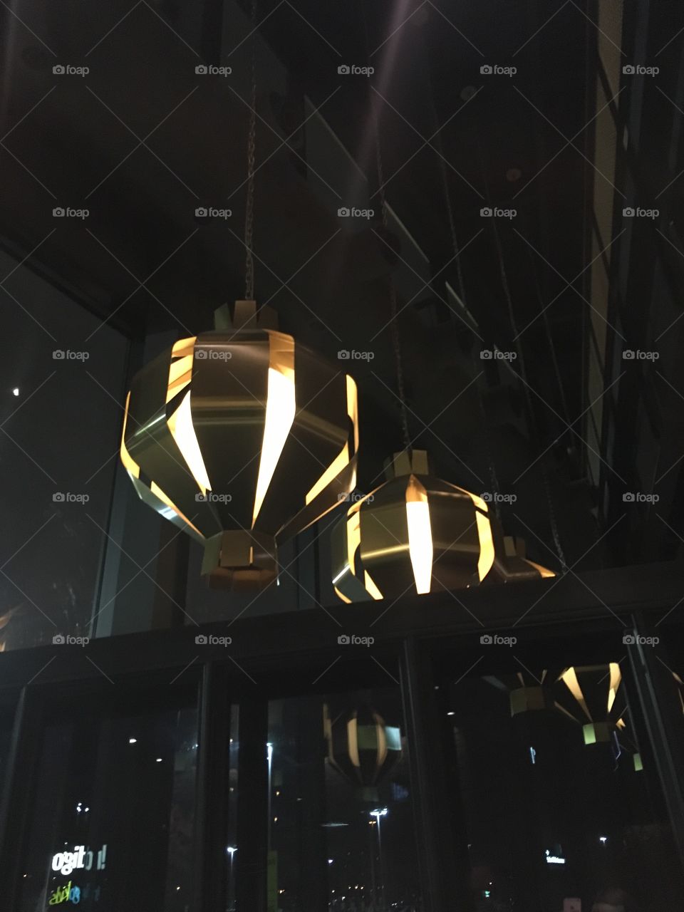 Beautiful inordinate lights hanging in the restaurant known as Joeys.