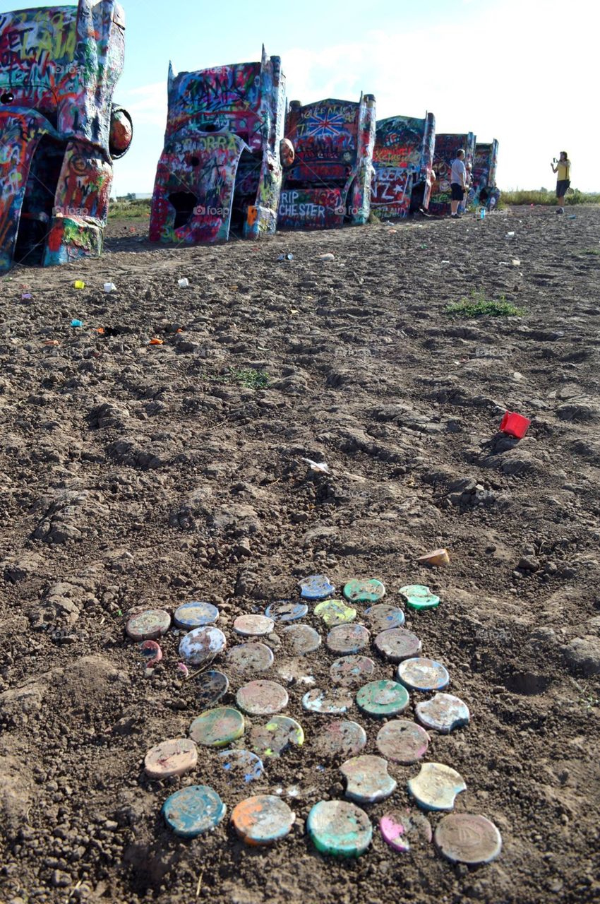 Paint can lids at Cadillac Ranch near Amarillo, Texas. 