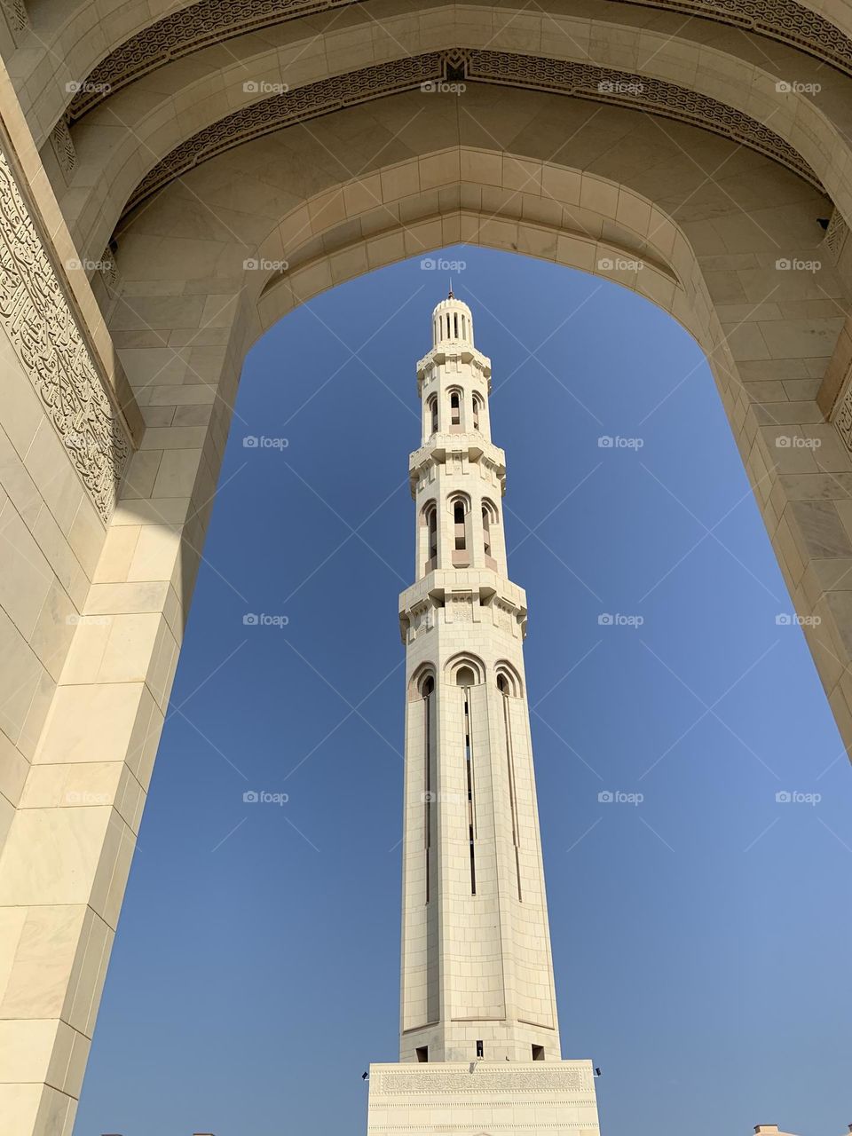 White tower between arch 