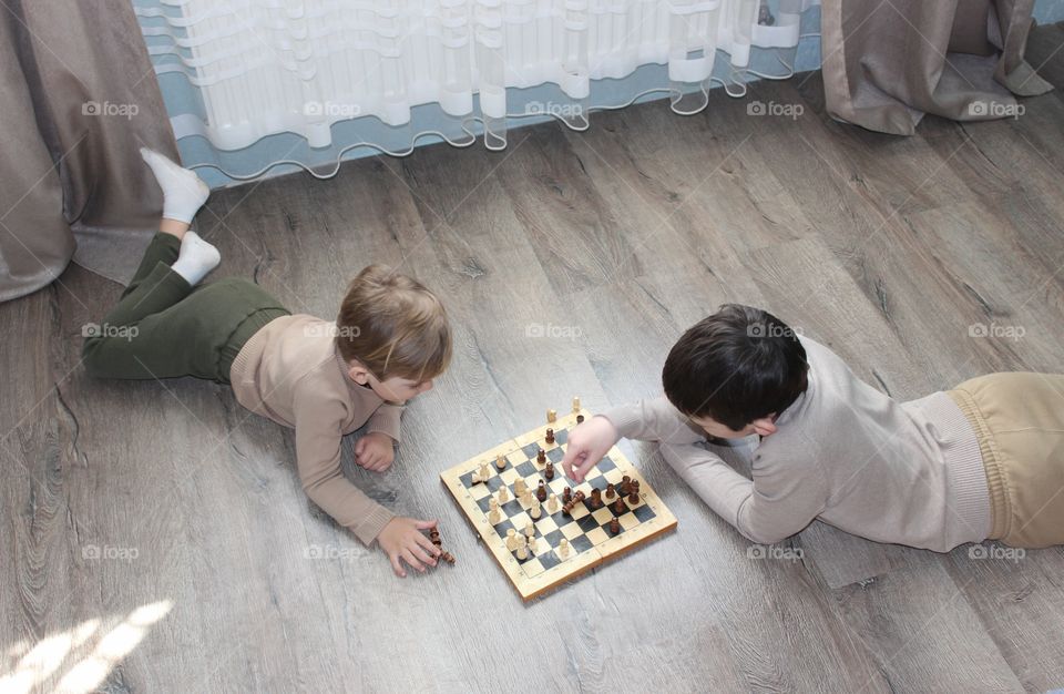 children play chess