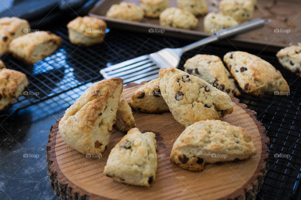 Baking scones in the kitchen with raisins and orange 