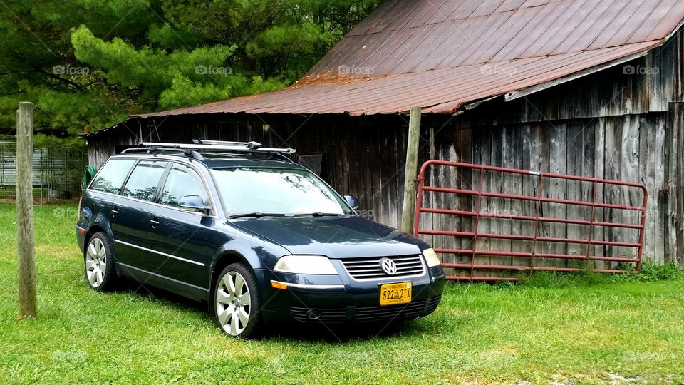 Volkswagen Passat in front of the barn