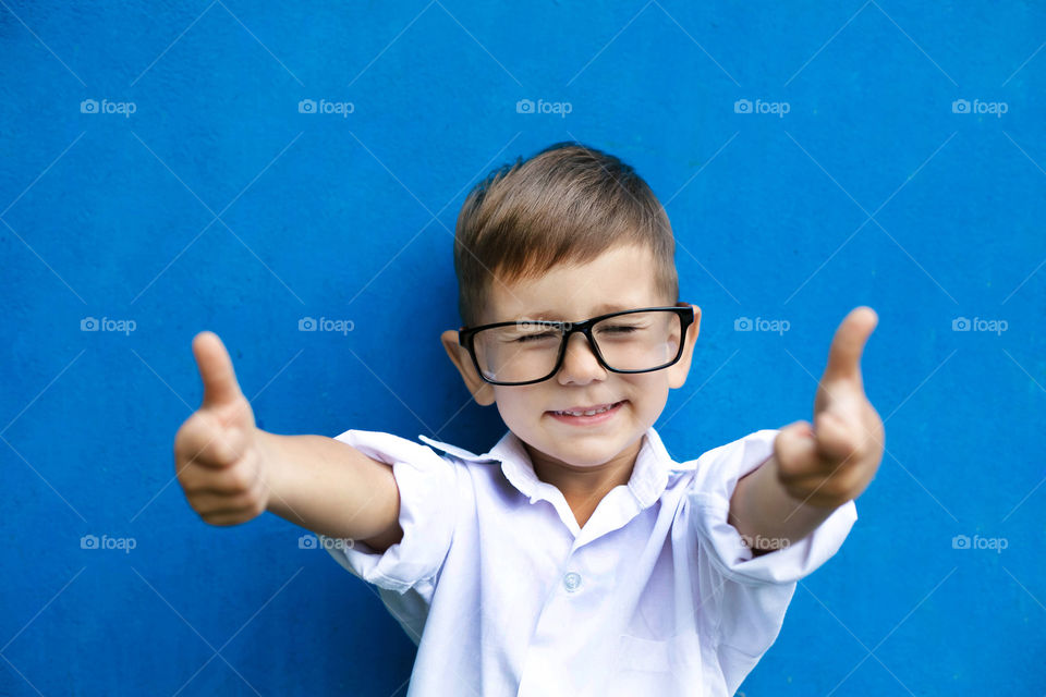 Cute little boy in glasses 
