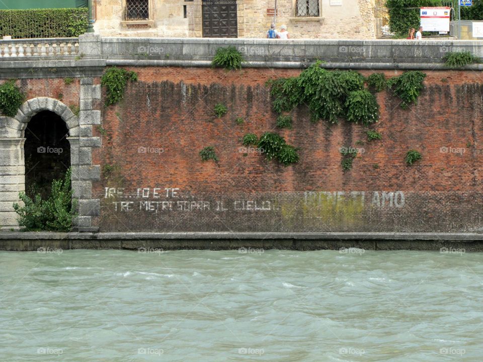 City landscape sourrounded by water in Verona, Italy