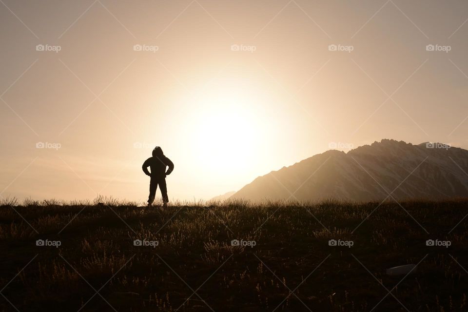 silhouette of a standing single man