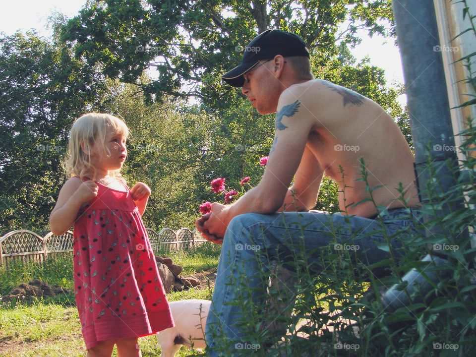 Father and daughter in park