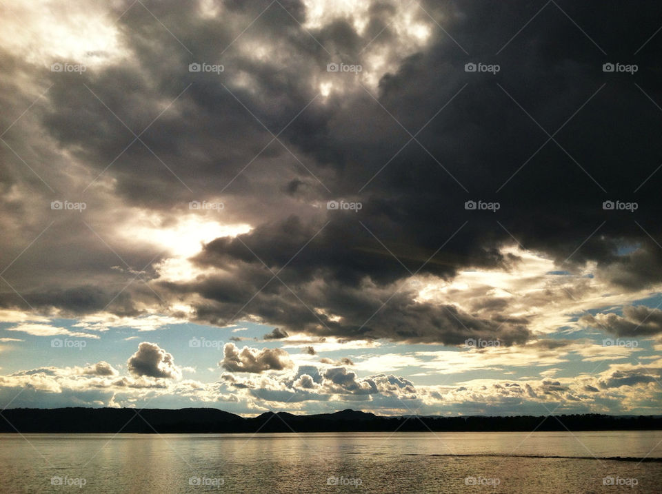 sky clouds river storm by delvec