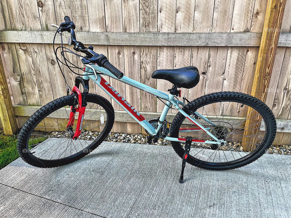 Bike outside, portrait of a bike, ready to ride a bike, biking for exercise, fun forms of exercise for adults 