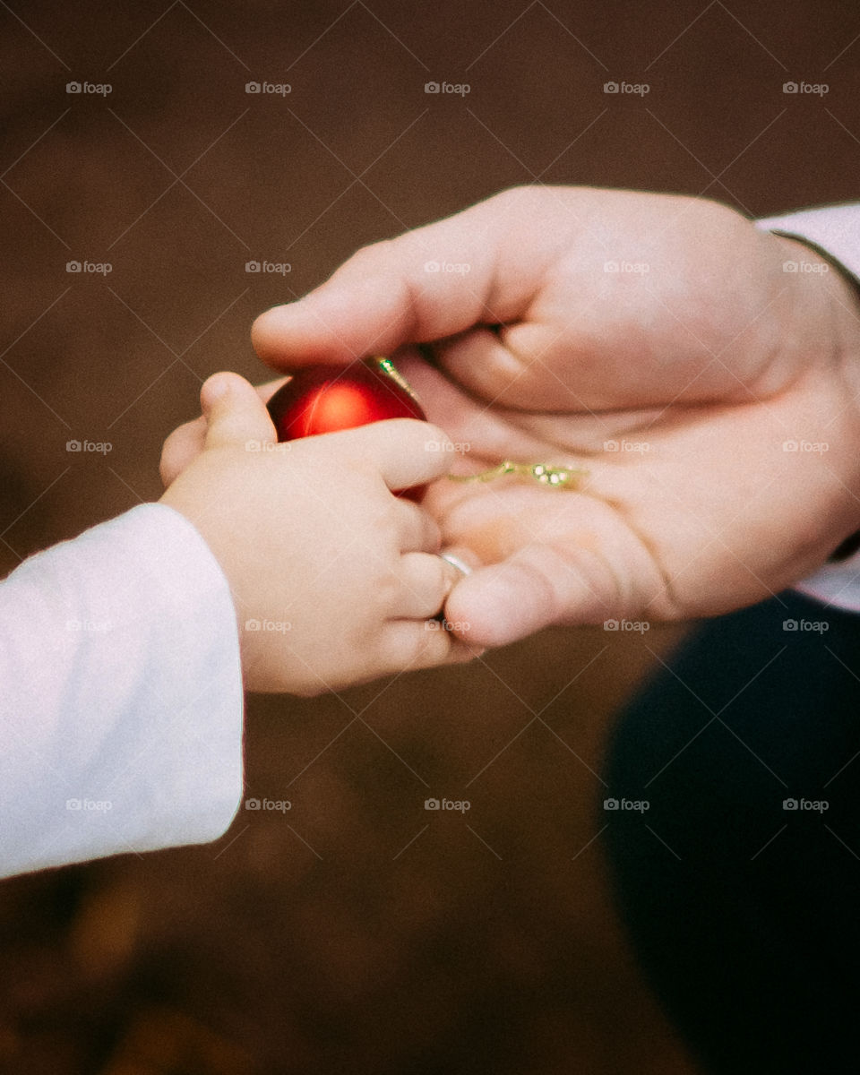 Hands. Gift. Christmas time.