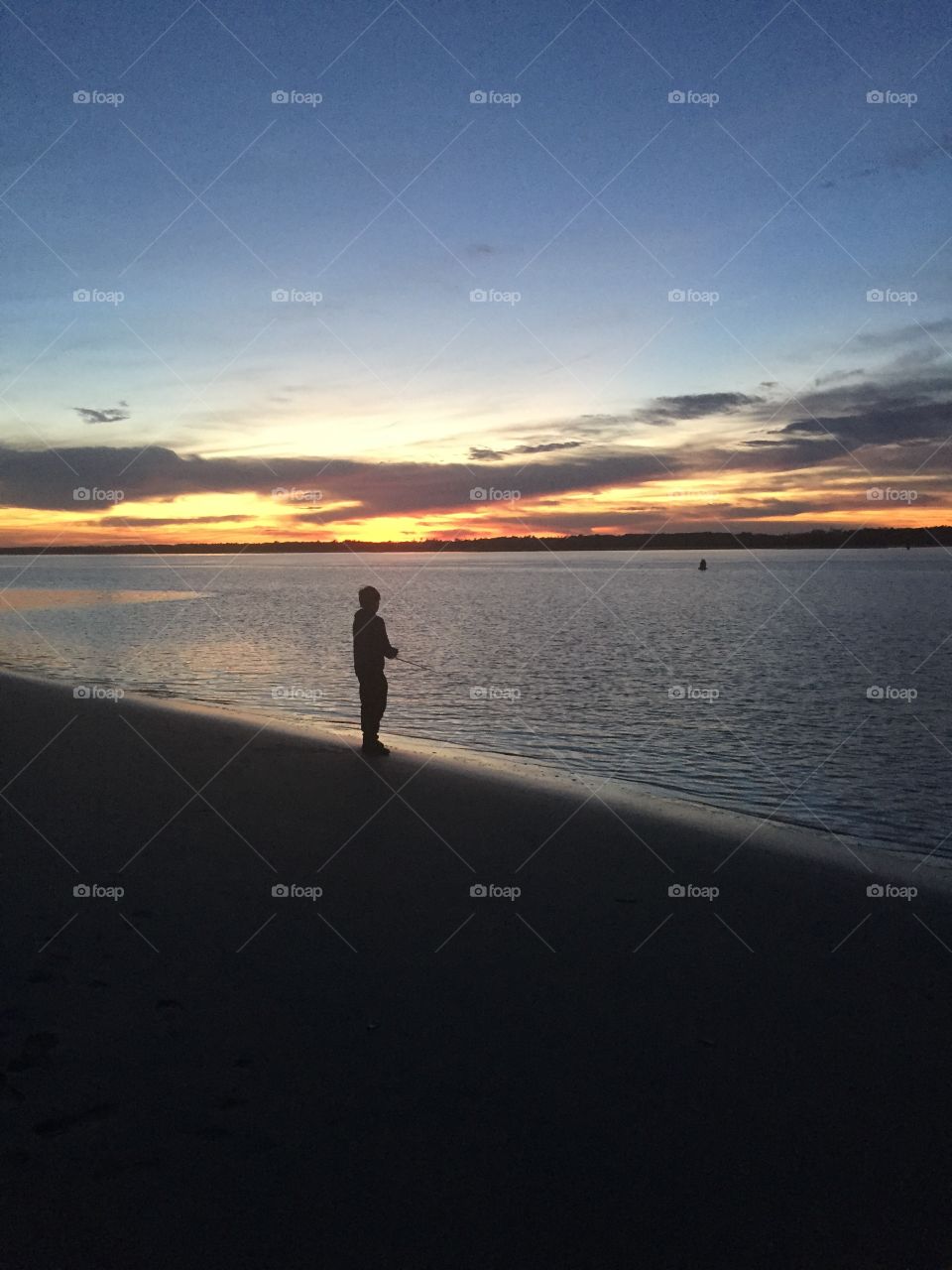 Sunset saltwater fishing on Wrightsville Beach, NC