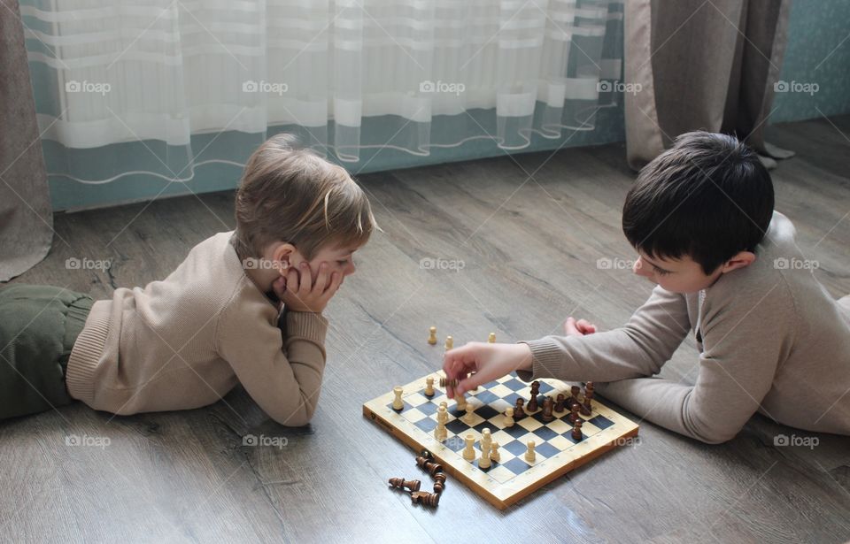 children play chess