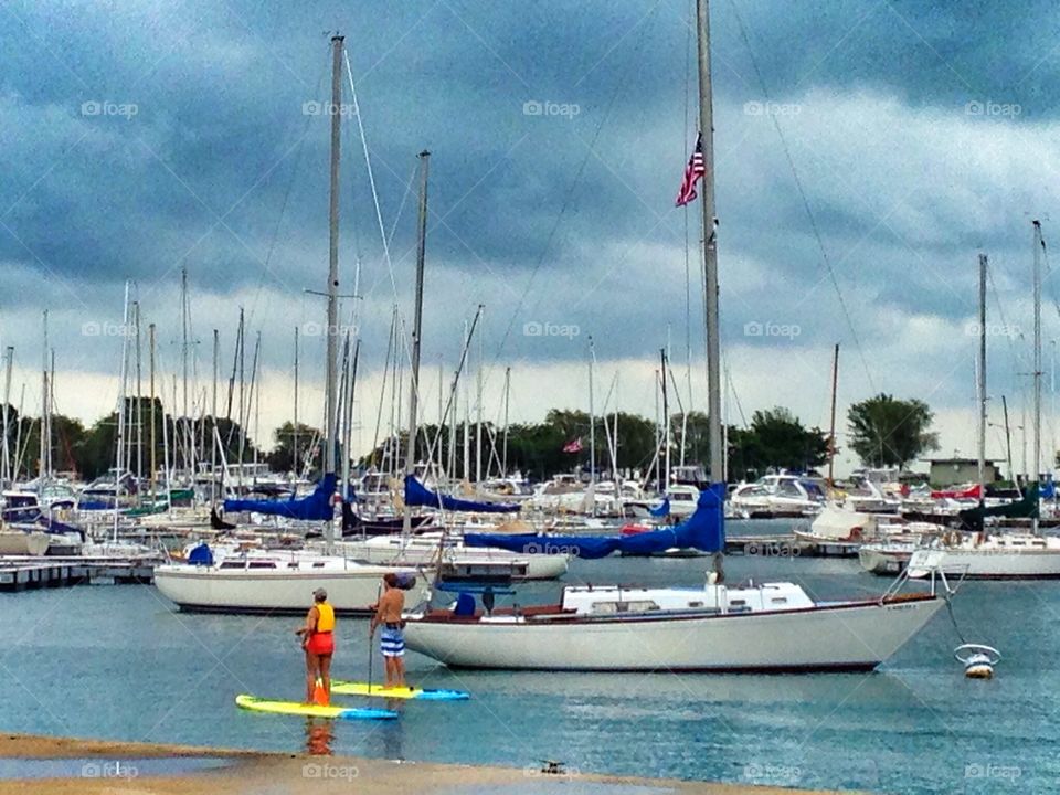 Sailboats. Paddle boarding 