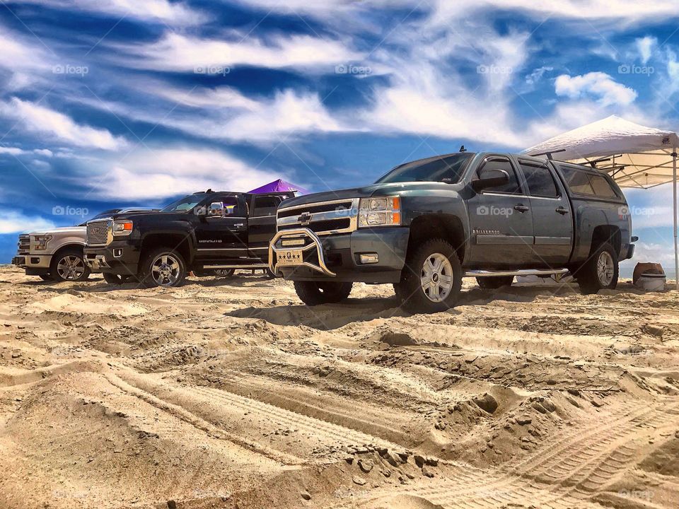 Trucks on the beach