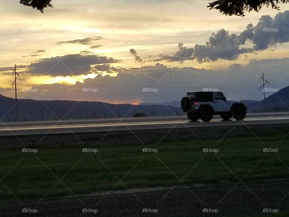 sunset and a Jeep