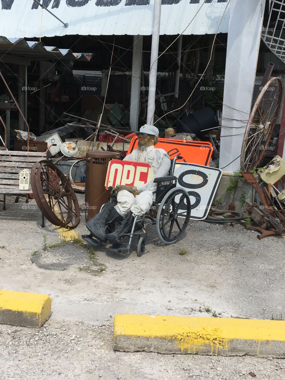 Creepy guy outside of barn shop