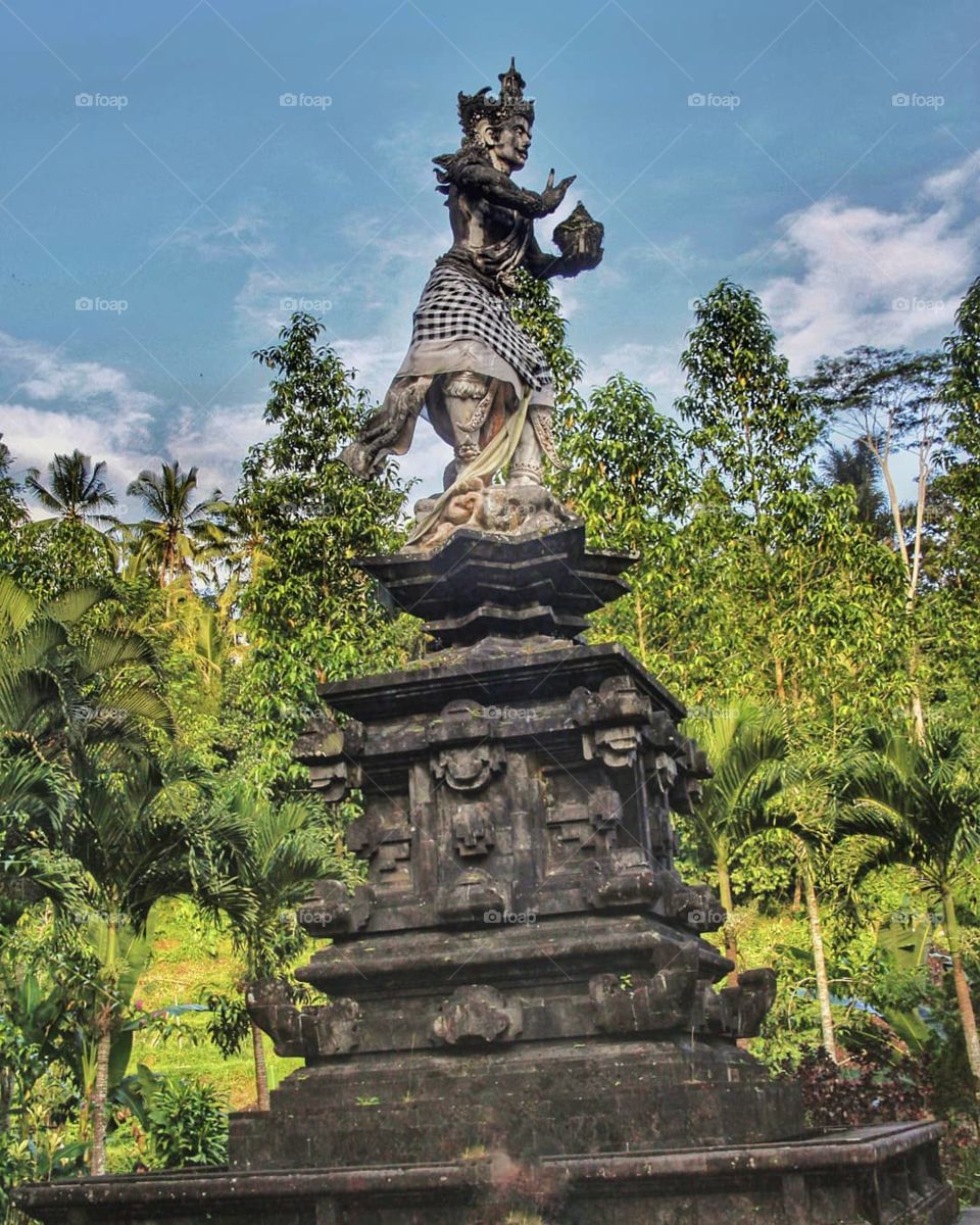 Mythological sculpture at the entrance of Tirta Empul,  Bali