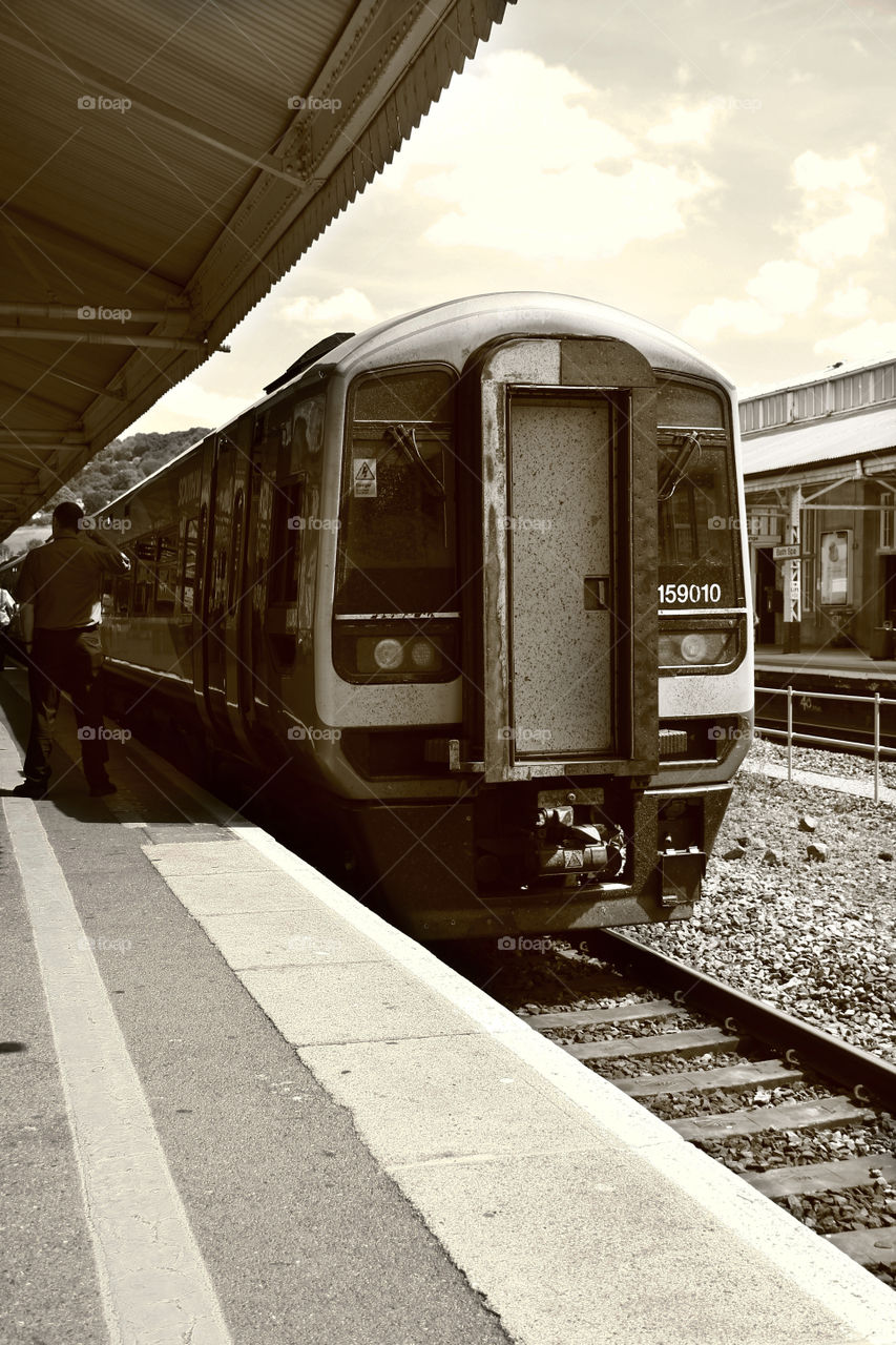 waiting train in sepia