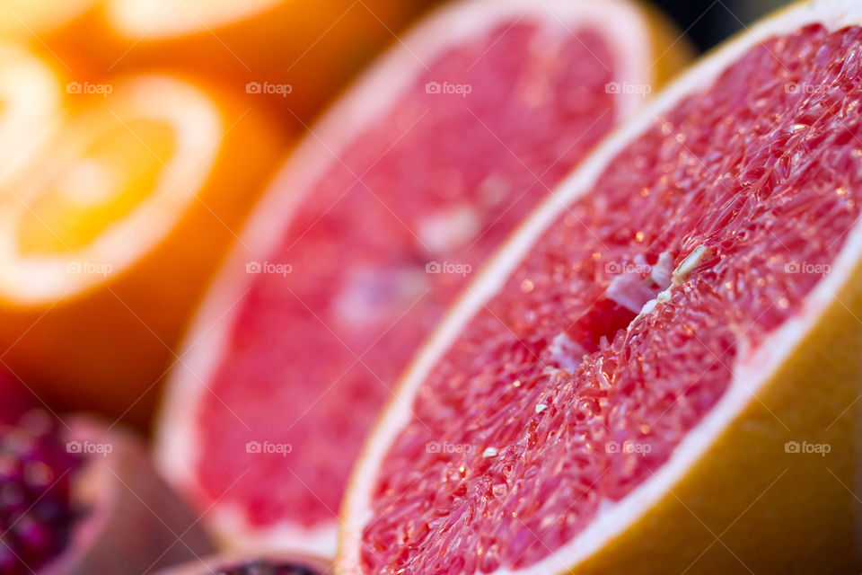 Closeup of sliced grapefruit in a grocery