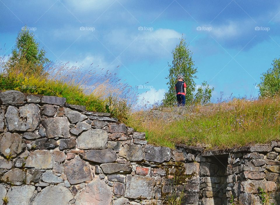 Old ruin. Boy looking on an old ruin in vetlanda sweden