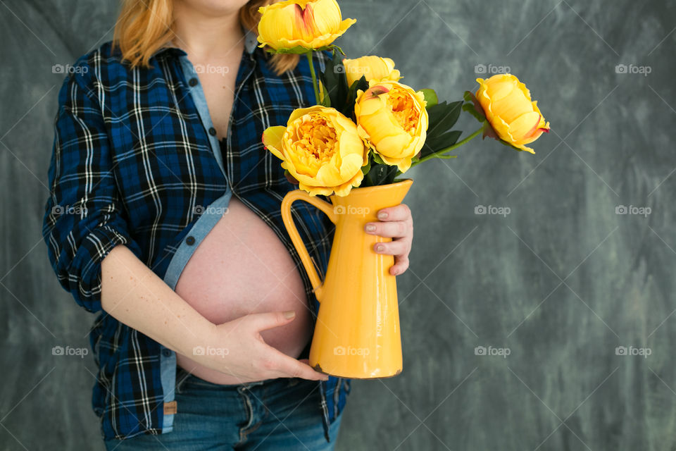 Flowers and pregnant woman