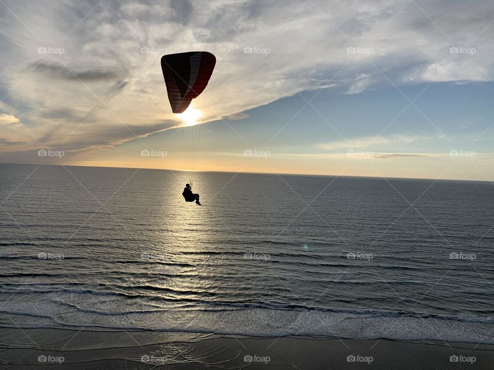 paragliding at sea beach