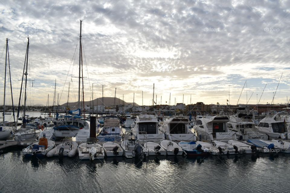 Boats harbor sunset