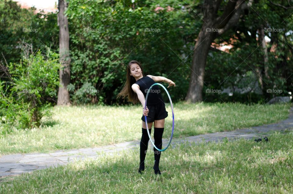 Beautiful Young Gimnast Dancing in Nature