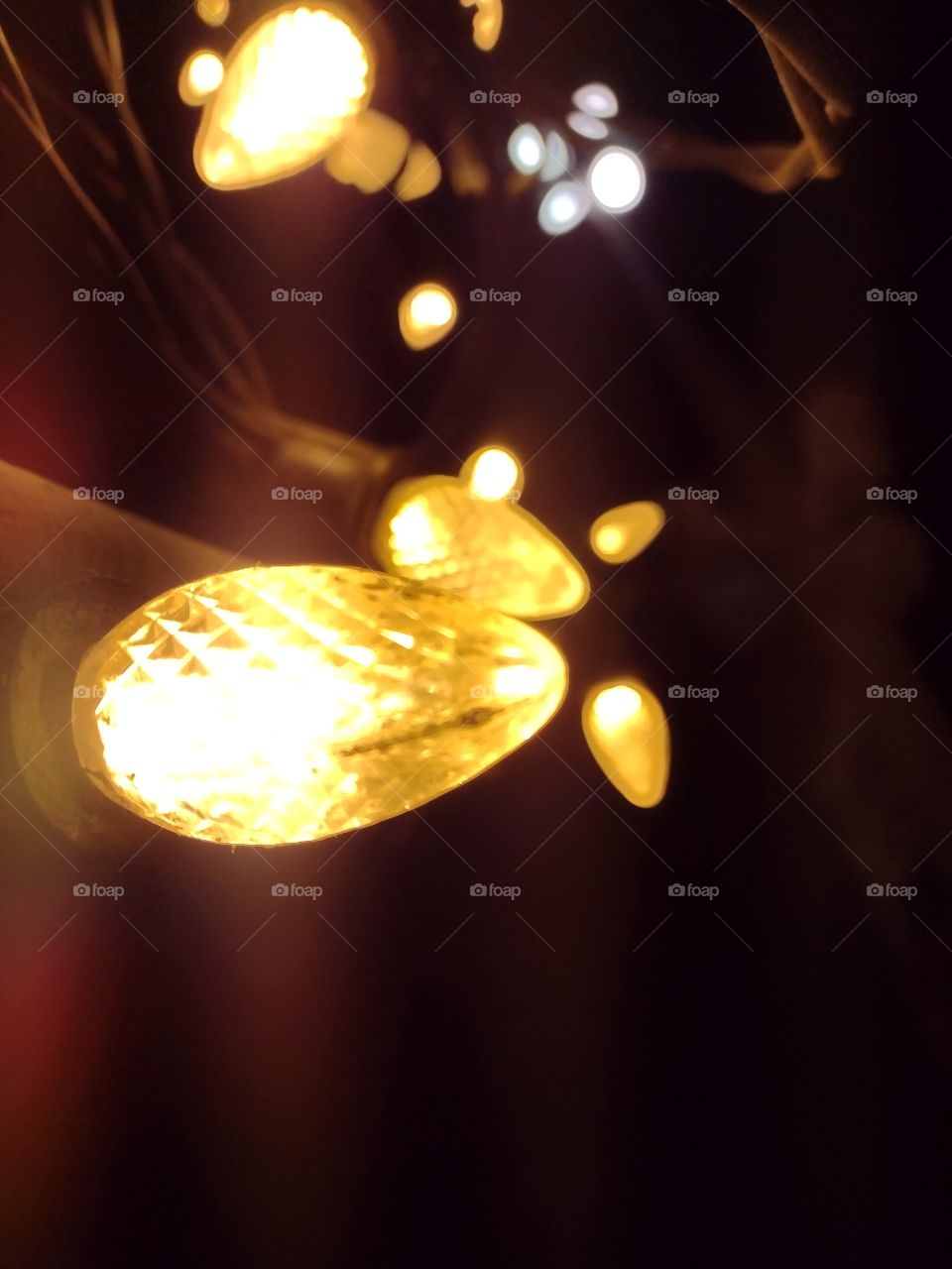 Unfiltered, beautiful, lovely close-up of yellow illuminated Christmas lights for the Holidays