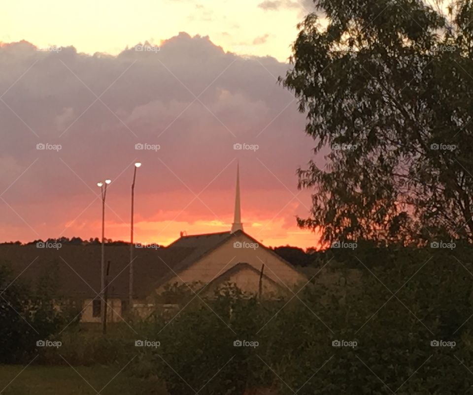 Sunset over church. 