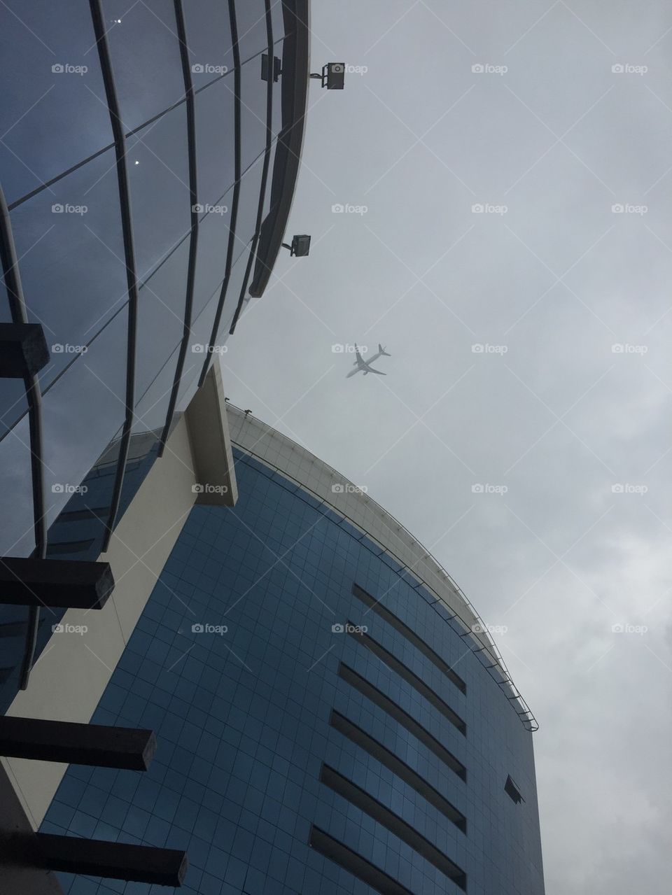 Plane flying in overcast conditions 