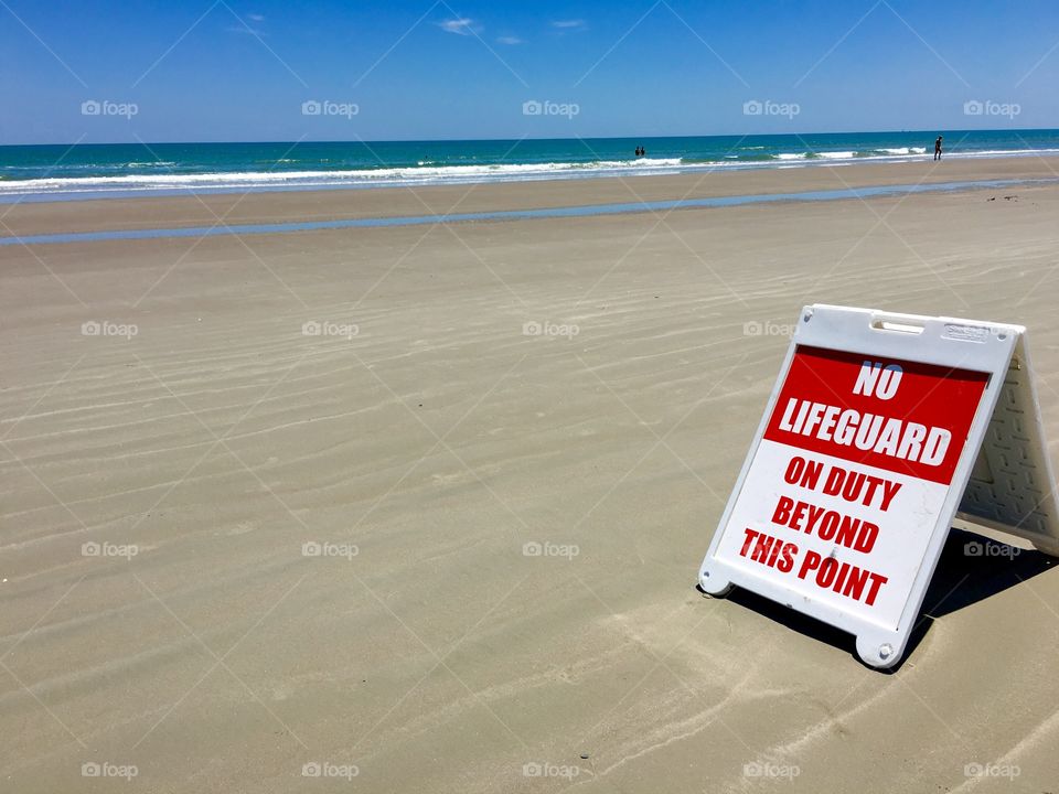 Red sign posted : No lifeguard on duty  