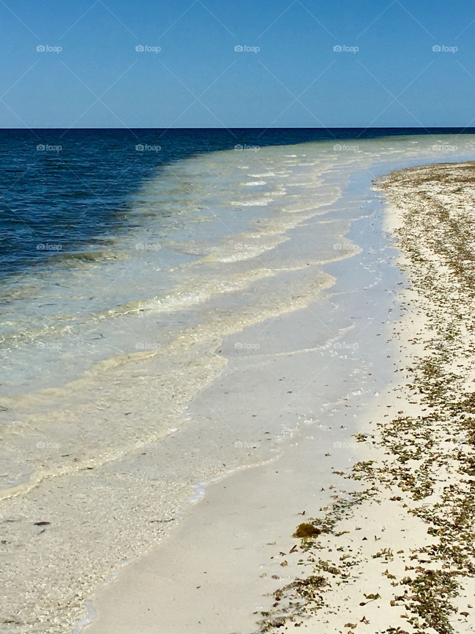 Pristine remote white sand beach, image suitable for background 