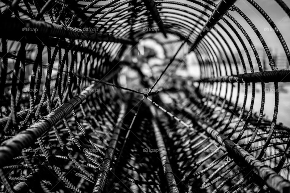 Inside the cage of rebar. 