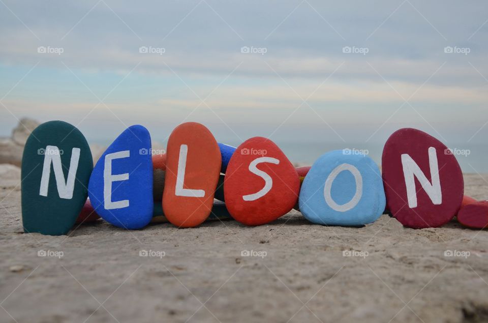 Nelson, male name on colourful stones