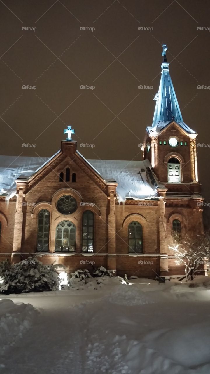 Jyvaskyla church twinkly in the winter snow On a crisp winter night 