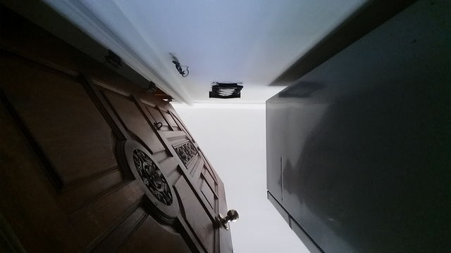 Accidently got the angle between wall, door and refrigerator. Looks a bit like horror sci fi film somehow