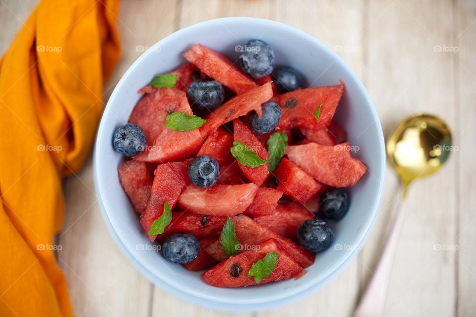 cup with fruit salad