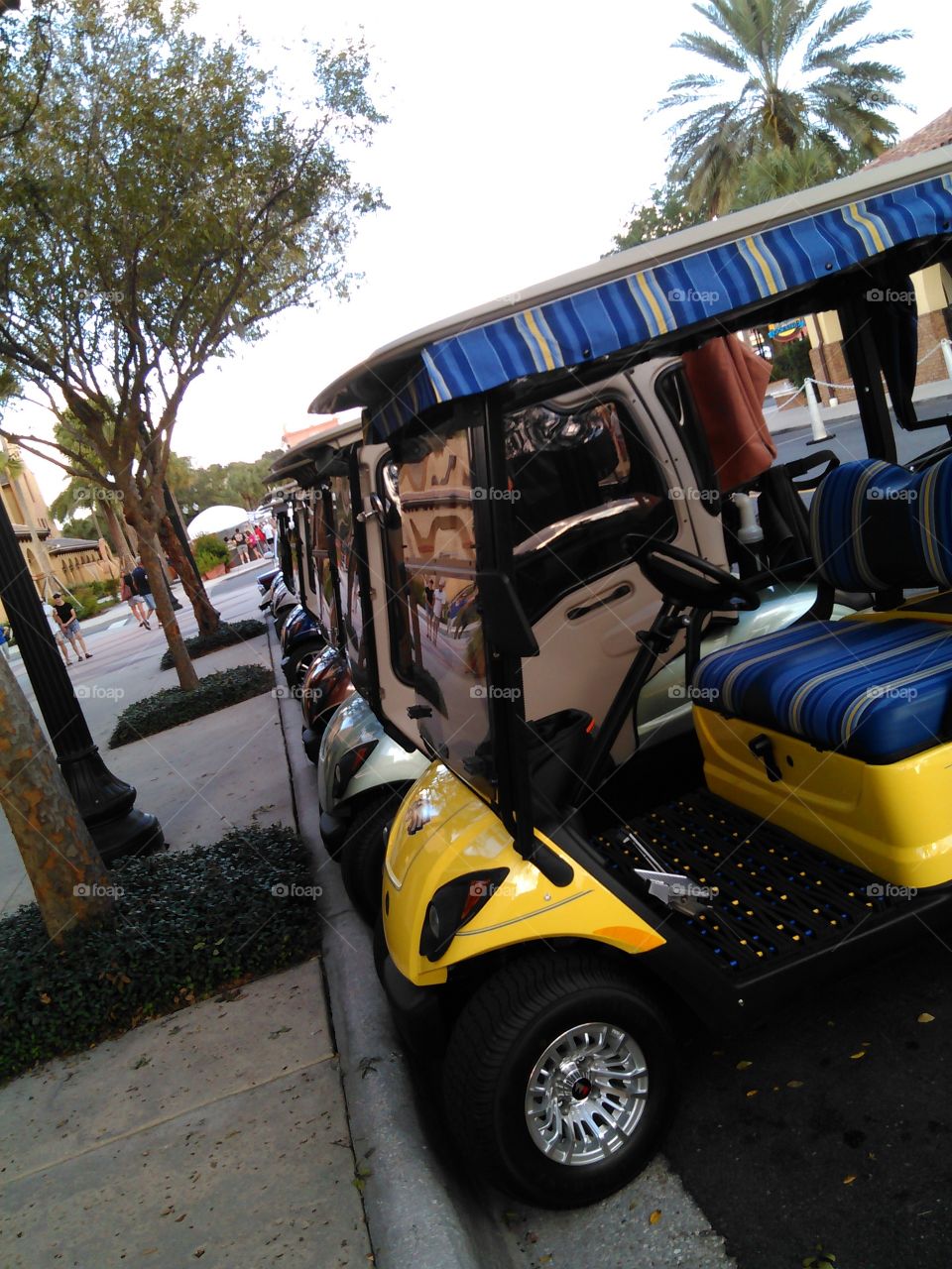 Golf Carts...the way to go.... This is how it's done in The Villages, Florida.