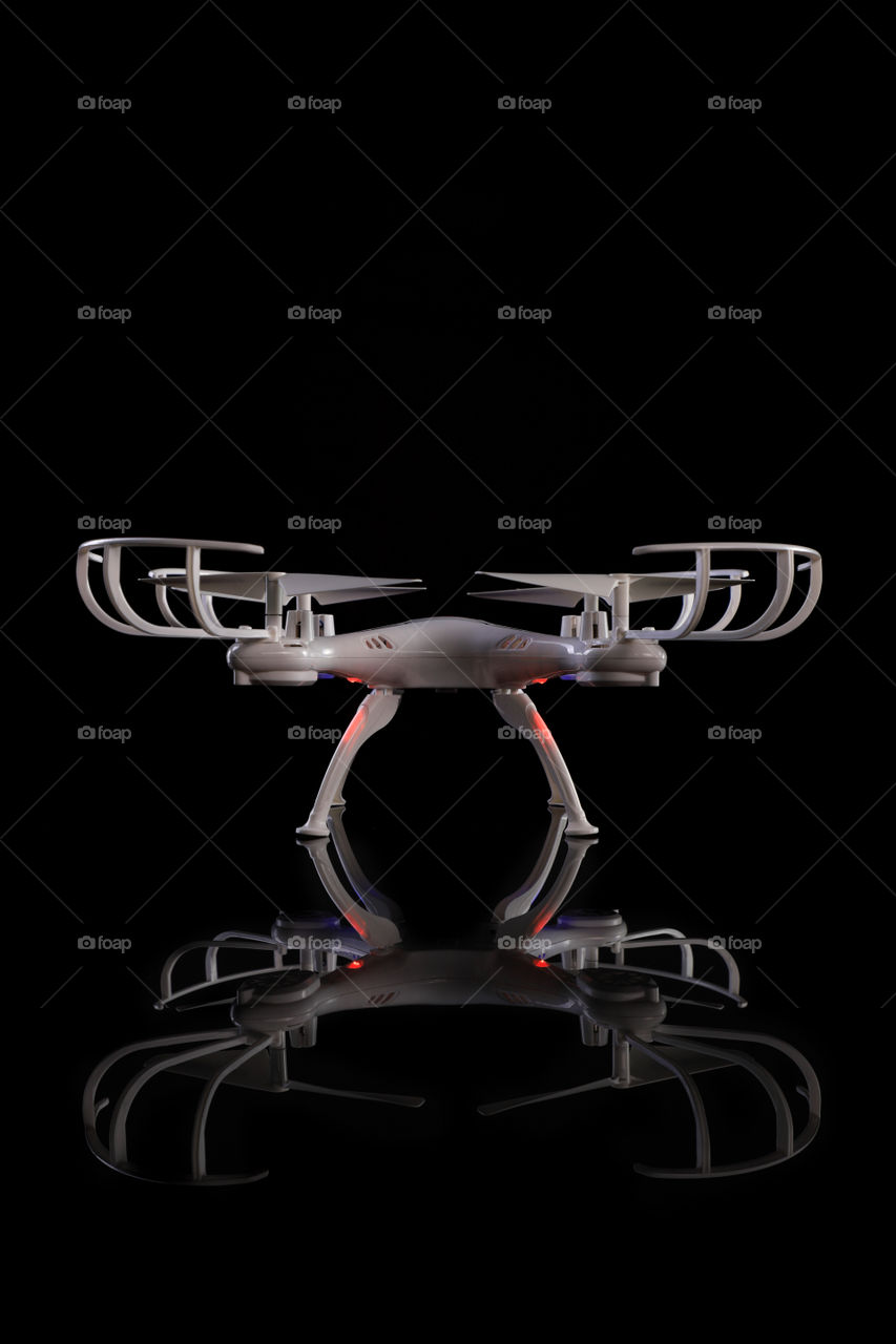 Drone technology gadget on black background